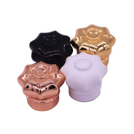kaufen Entwurfs-einzigartige Kristallzink-Legierungs-Parfüm-Abdeckung, Blumen-Form-Metallkronen-Abdeckung online manufacture